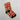 Calcetines de Navidad personalizados rojos con la cara de una abuela y la de un bebé, entre acebo, bastones de caramelo y FELIZ NAVIDAD